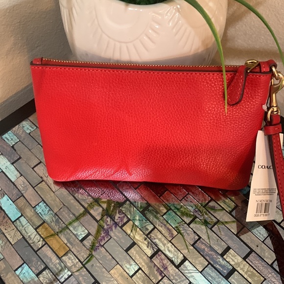 Coach Leather Wristlet
COACH - Picture 7 of 17